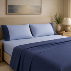 Completo-Lenzuola-mano-seta®-Bicolore-Celeste-Blu-letto.jpg