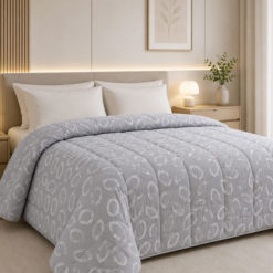 Trapunta-mano-seta®-invernale-Dalia-Grigio-letto.jpg